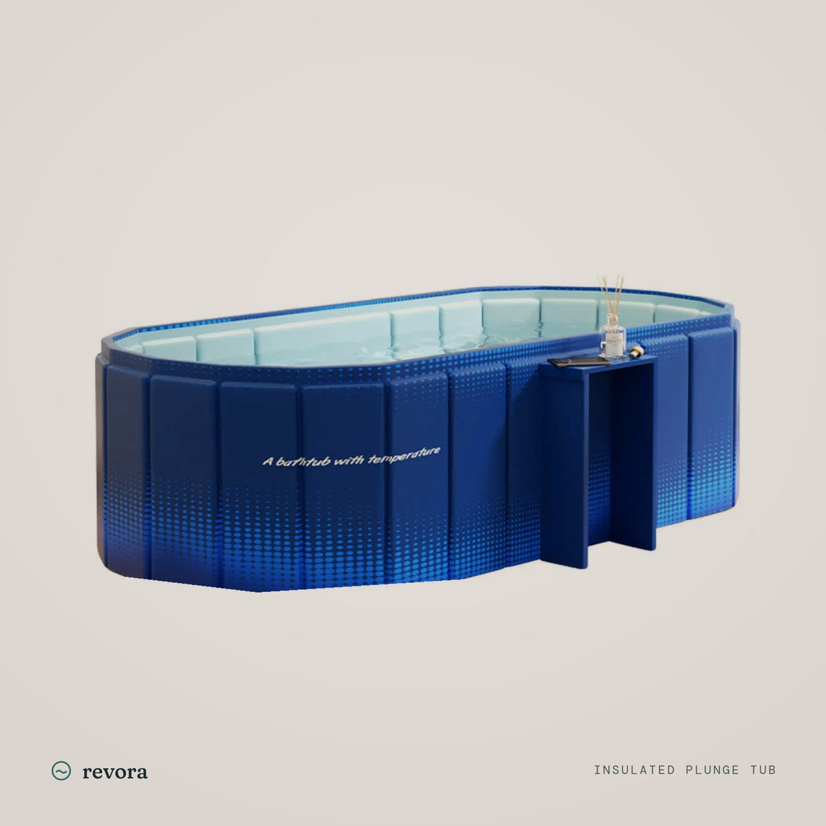 Revora Insulated Plunge Tub, a rigid blue oval cold plunge tub with a side shelf