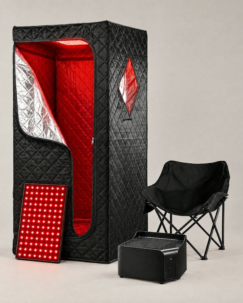 The Revora infrared sauna: a black quilted sauna tent with a red light panel and a heater